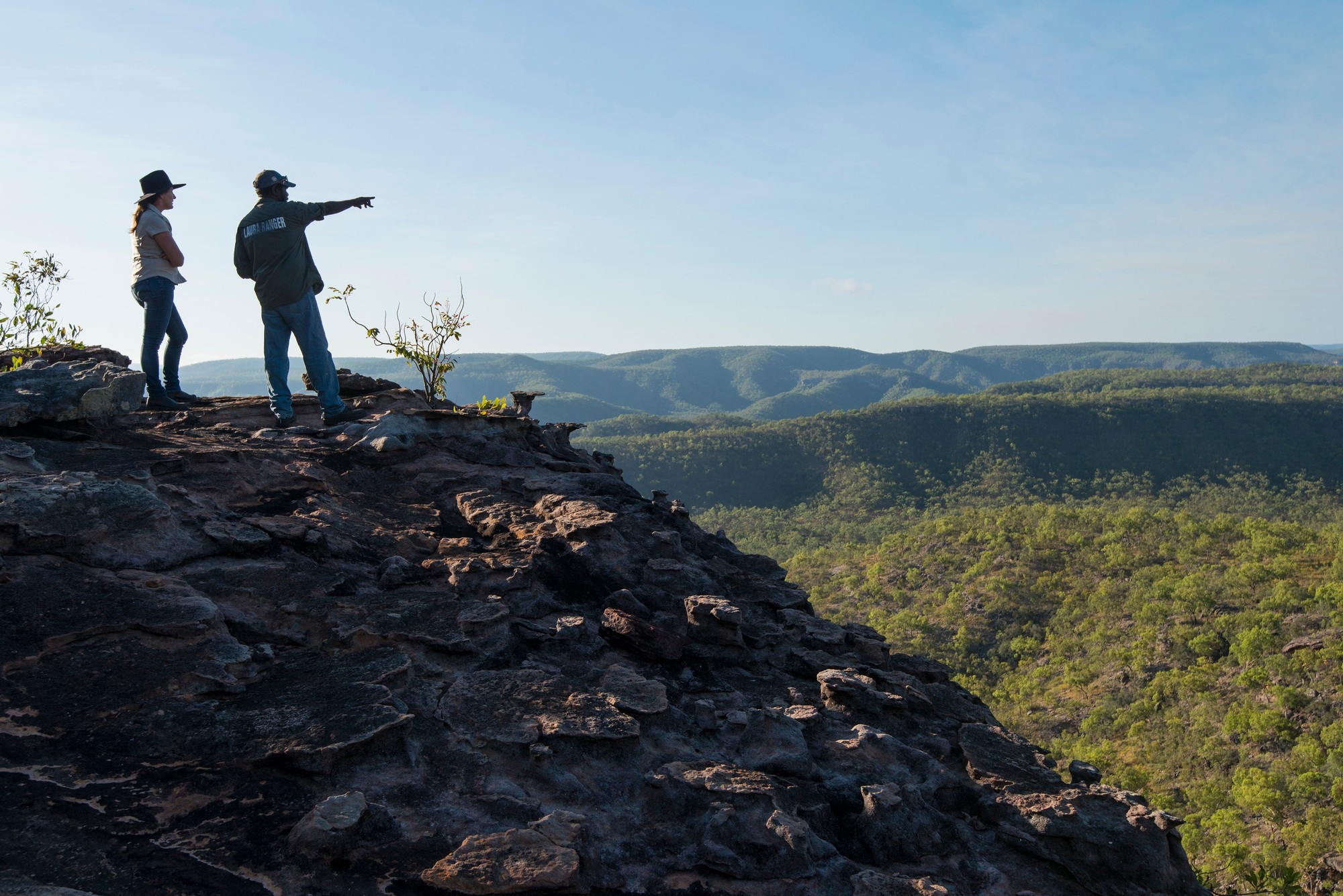 Indigenous Ranger looks out over bluff